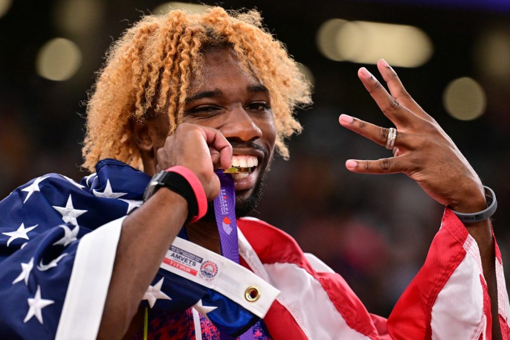 Lyles emulates Bolt with fourth world 200m title