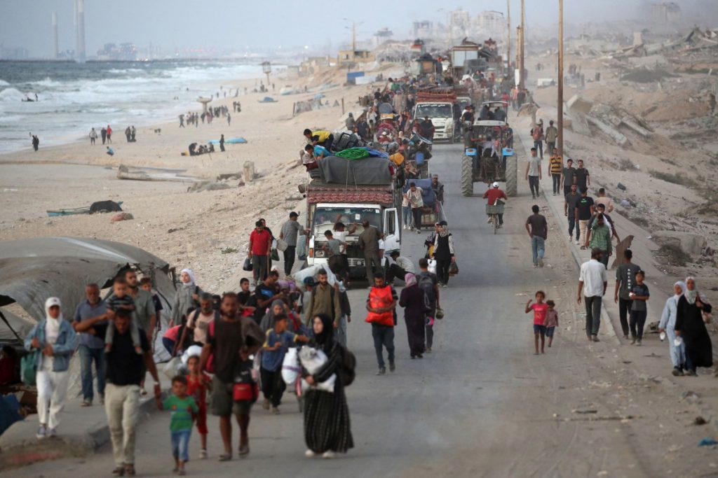 ‘We live with the dead’: Displaced Gazans shelter in cemetery