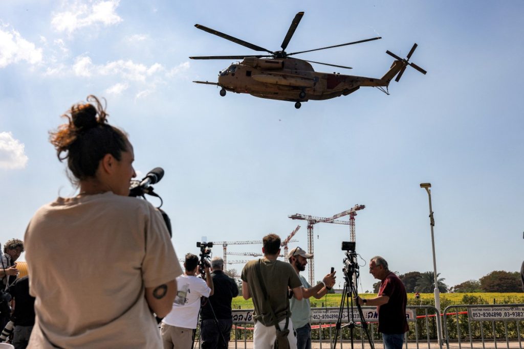 Photos: Israel says all 20 surviving Gaza hostages back home